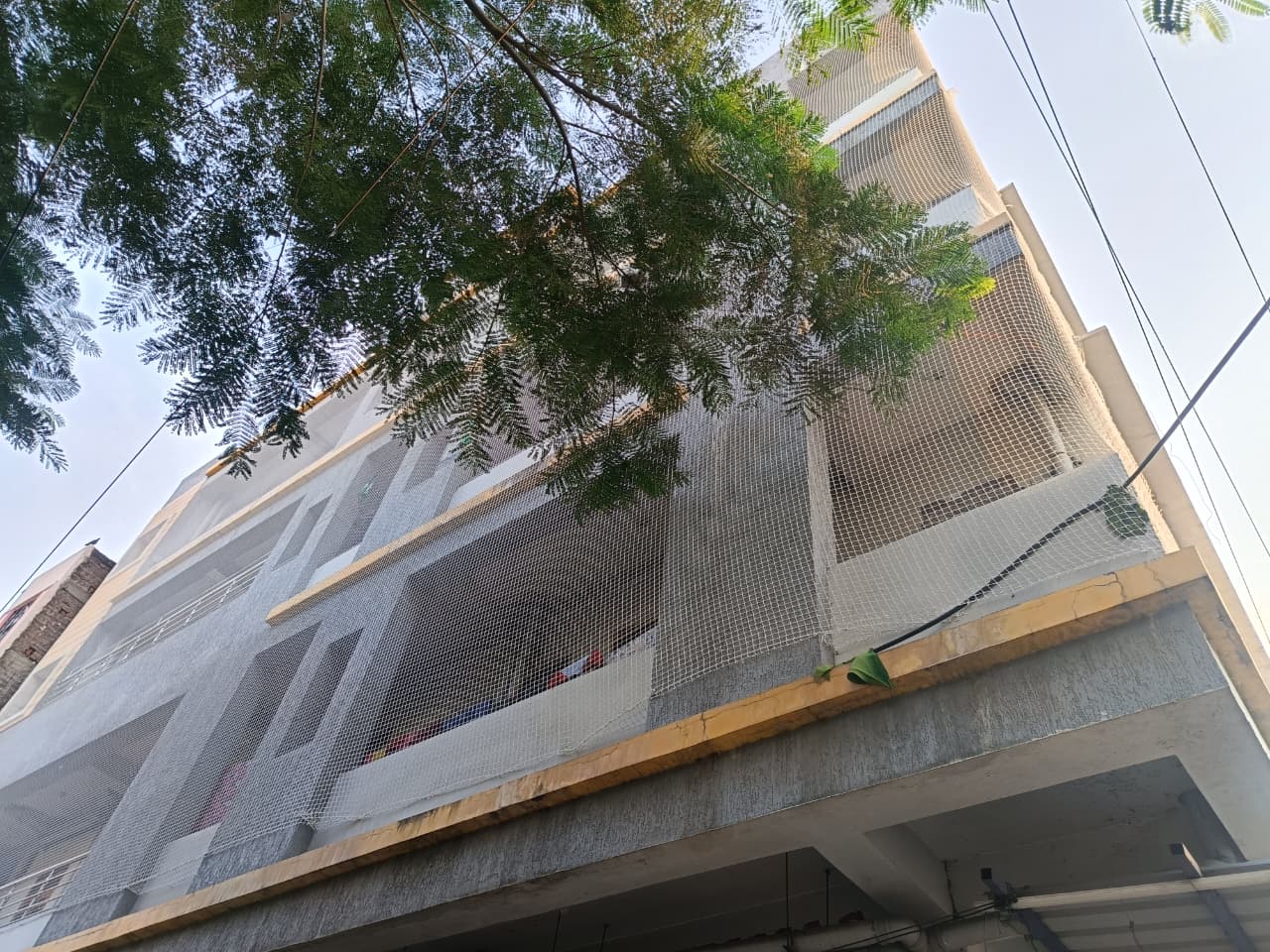 Building covered with safety nets in Hyderabad