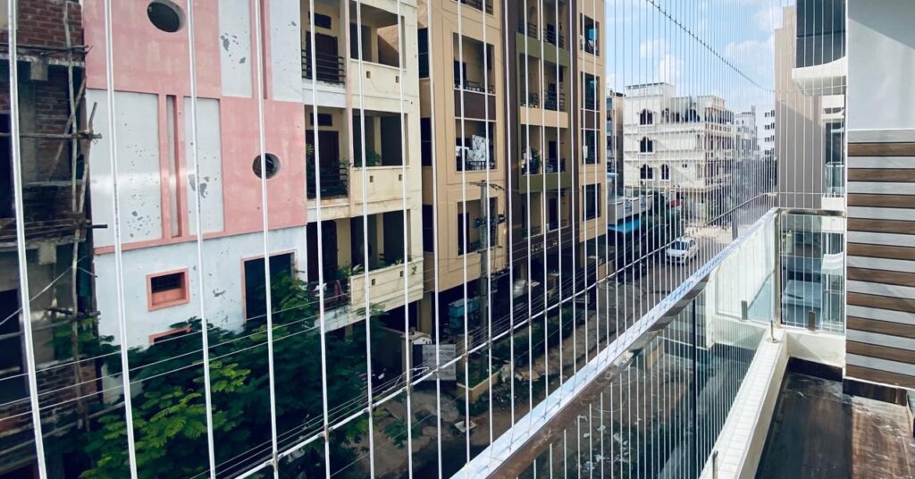 balcony invisible grill installation.jpg