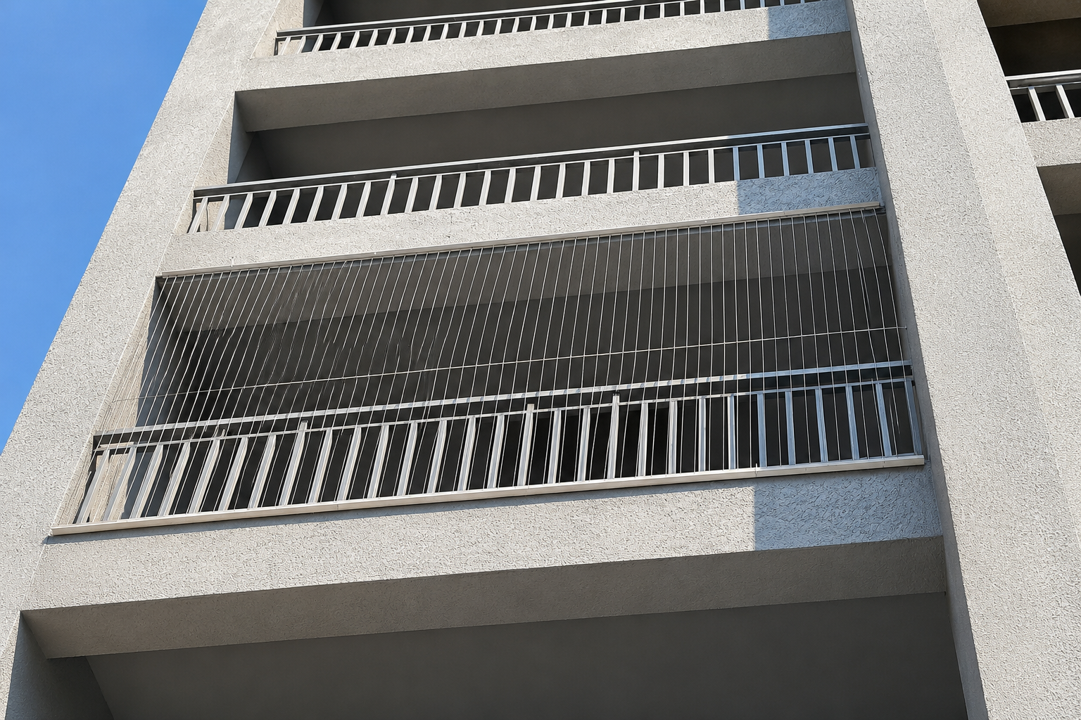 Invisible grills installation on apartment balcony in Andhra Pradesh